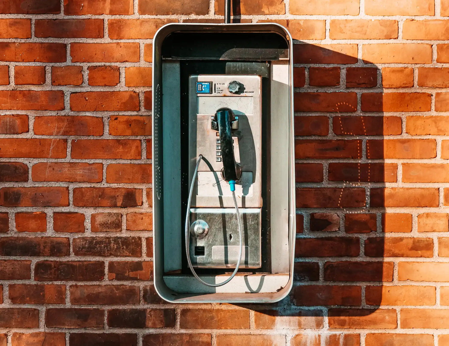 Public payphone booth.